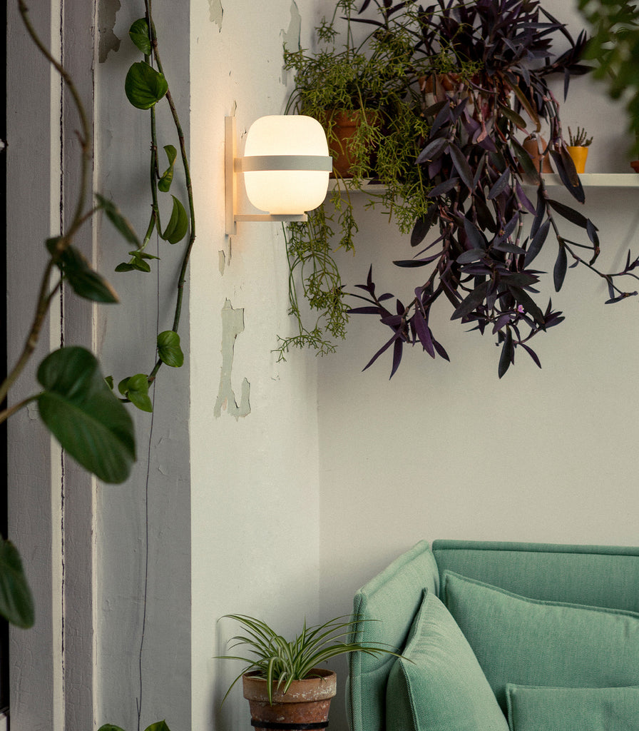 Santa & Cole Wally Cestita Wall Light featured within interior space