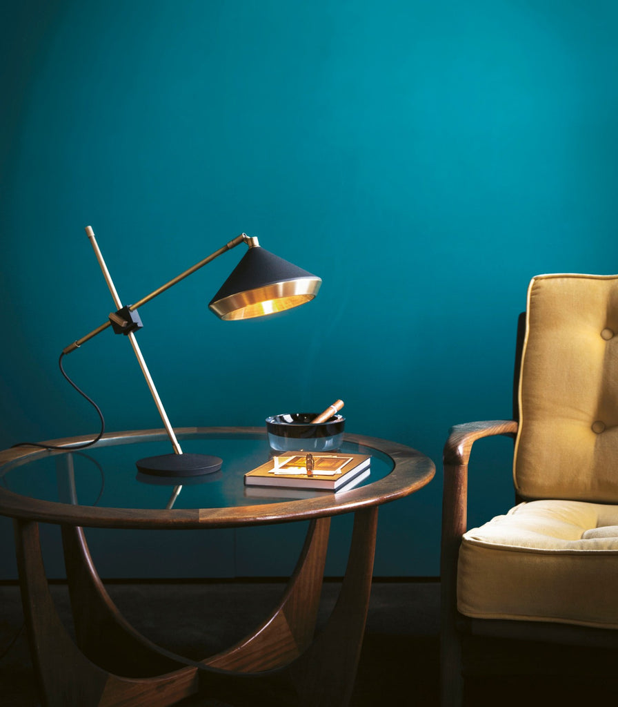 SBert Frank hear Table Lamp featured within a interior space