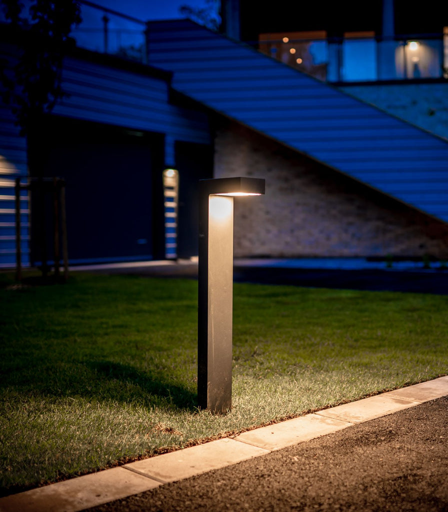 Norlys Asker Bollard Light featured within outdoor space