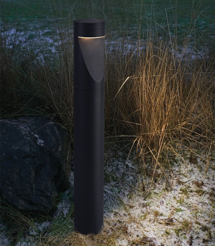 Norlys Oppland Bollard Light featured within a outdoor space