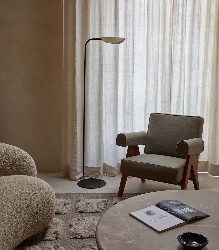 Aromas Ficus Floor Lamp placed beside the chair