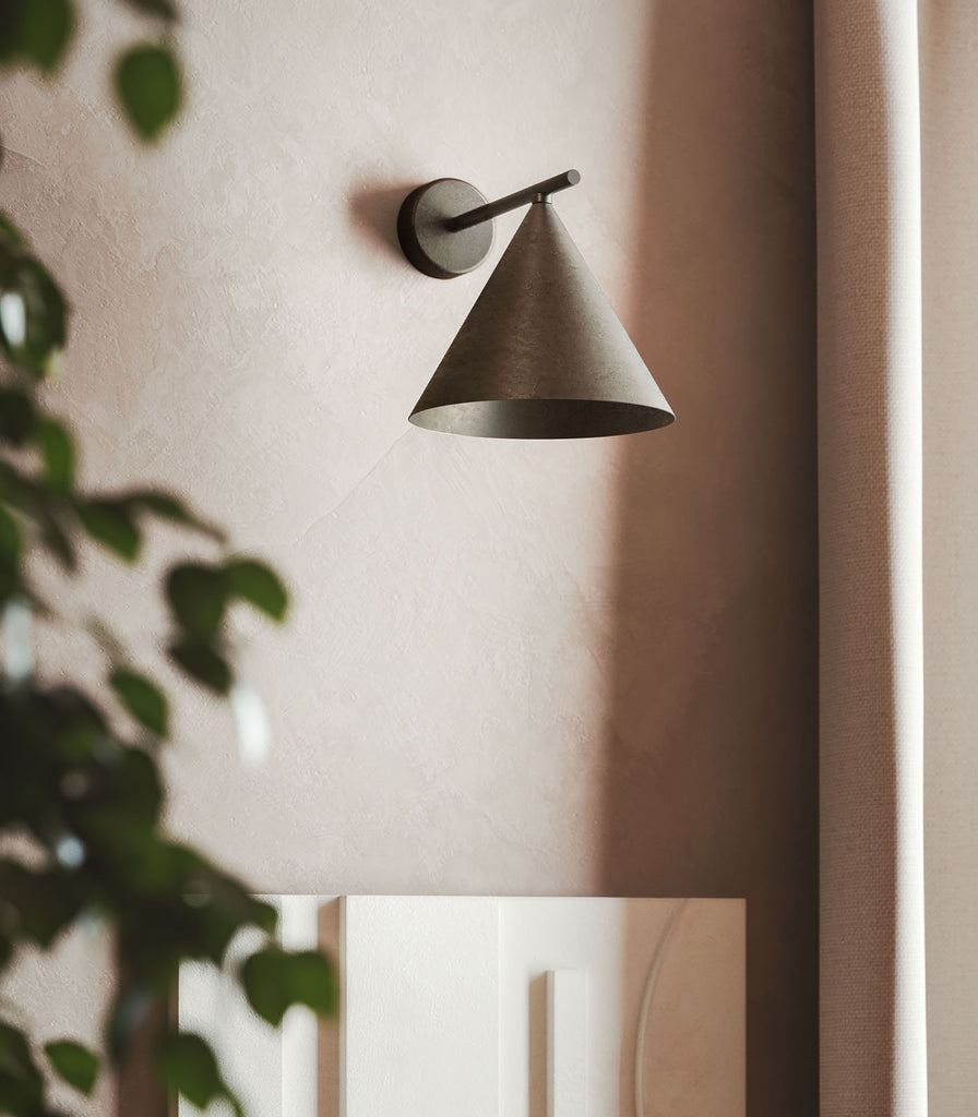 Il Fanale Cone Straight Wall Light featured within a interior space
