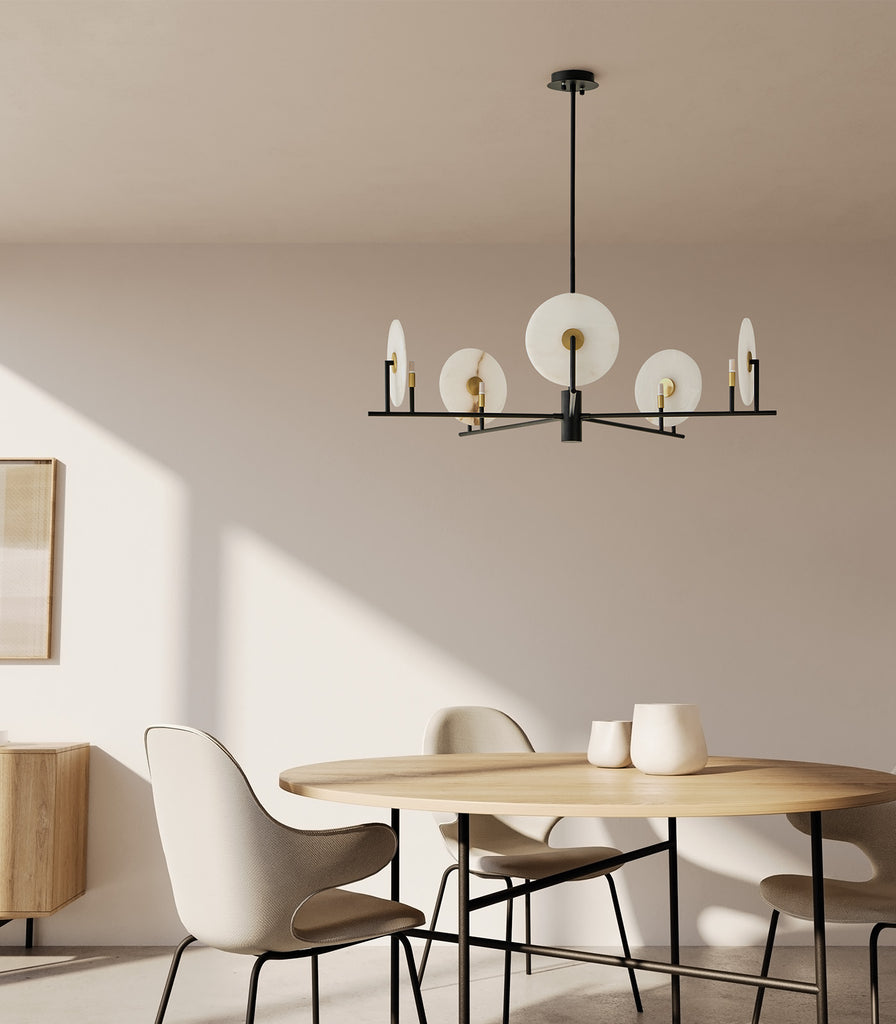 Aromas Erto 5Lt Pendant Light hanging over dining table
