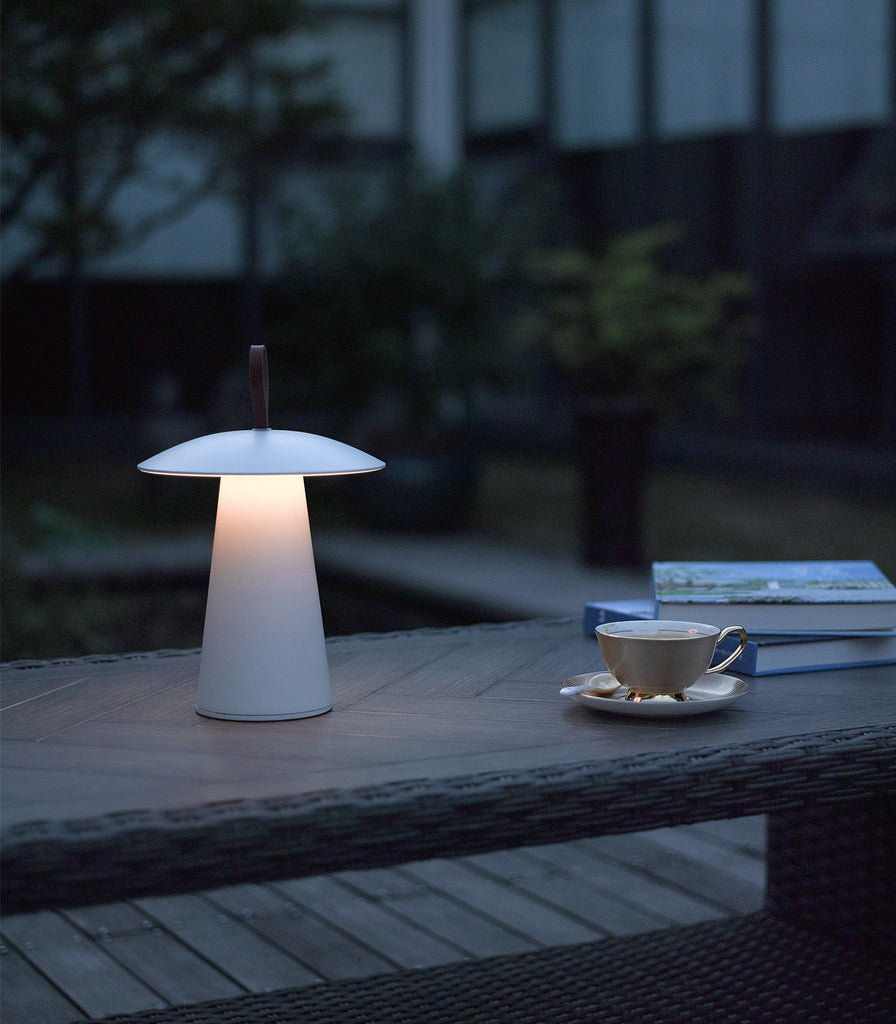  Nordlux Ara To Go Table Lamp featured within outdoor space