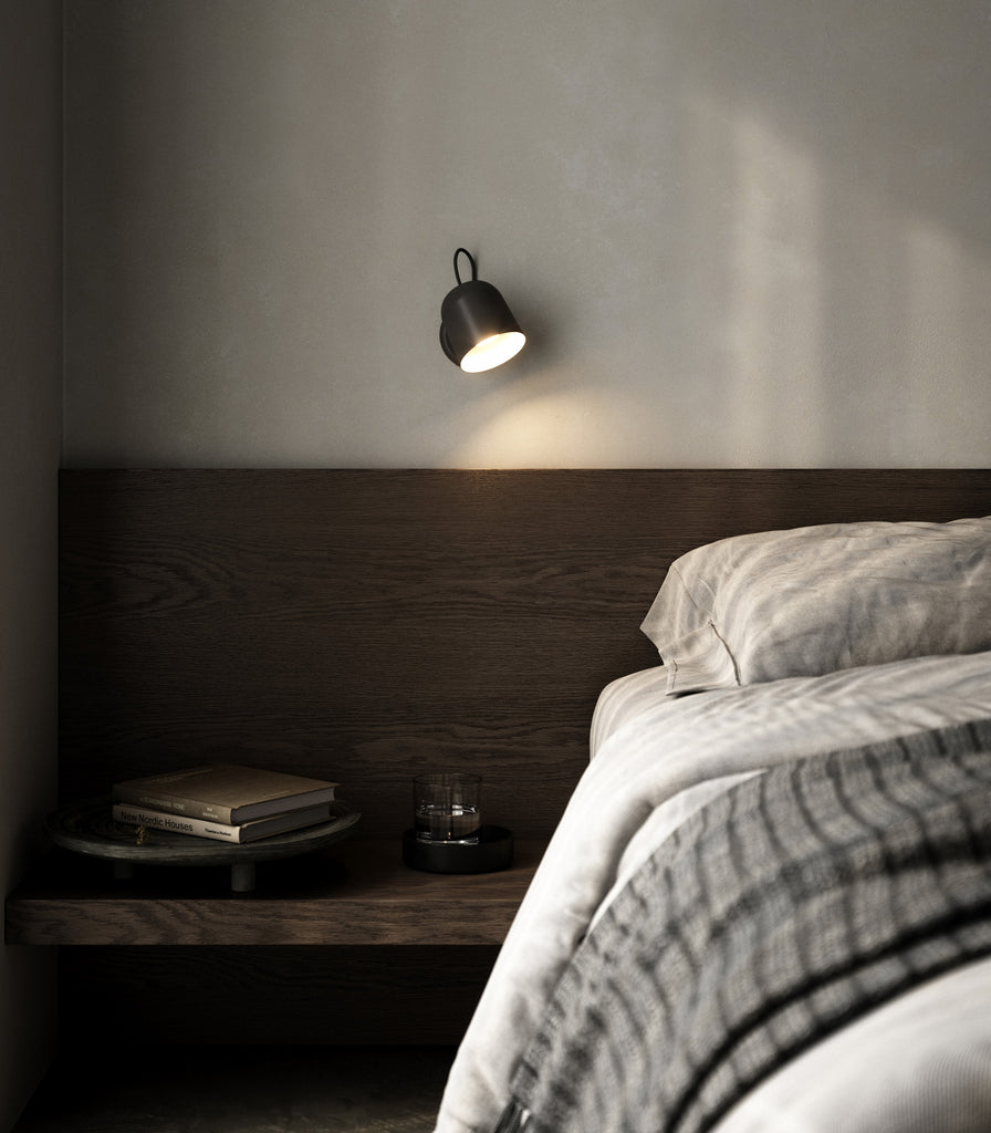  Nordlux Angle Wall Light placed above bedside table