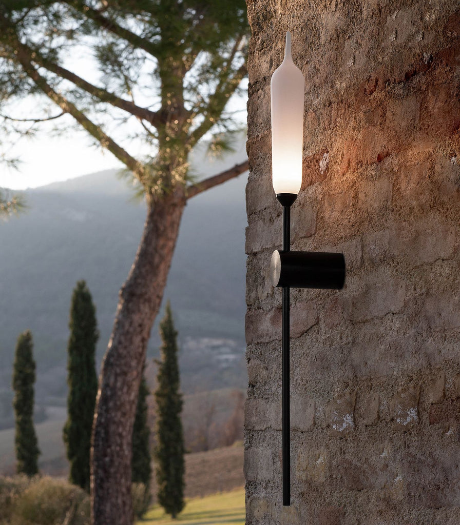 Karman Nilo Wall Light in featured within a outdoor space