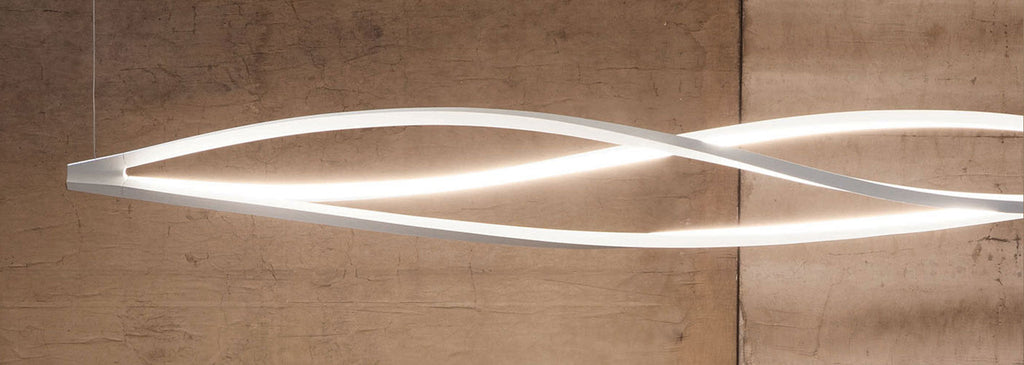 In The Wind Horizontal Pendant Light by Arihiro Miyake for Nemo Lighting, sculptural white pendant with twisting form, suspended against a textured wall.