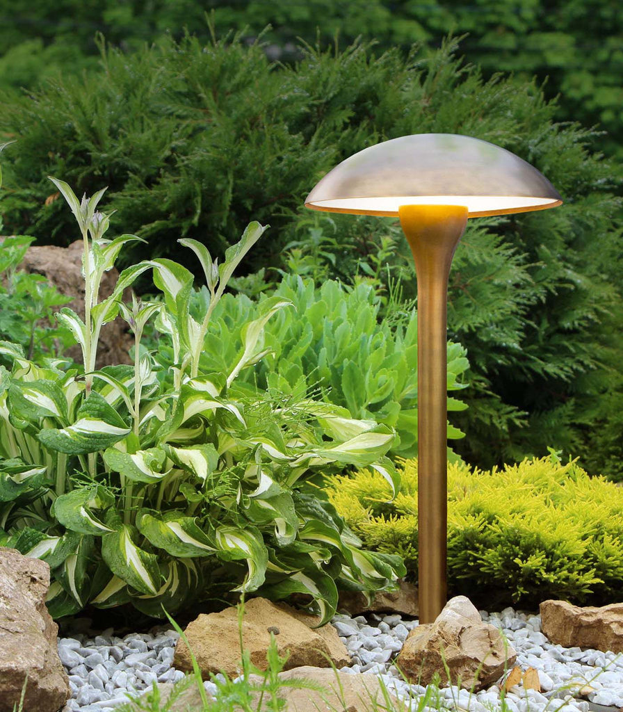 Royal Botania Fungy Bollard Light featured within outdoor space