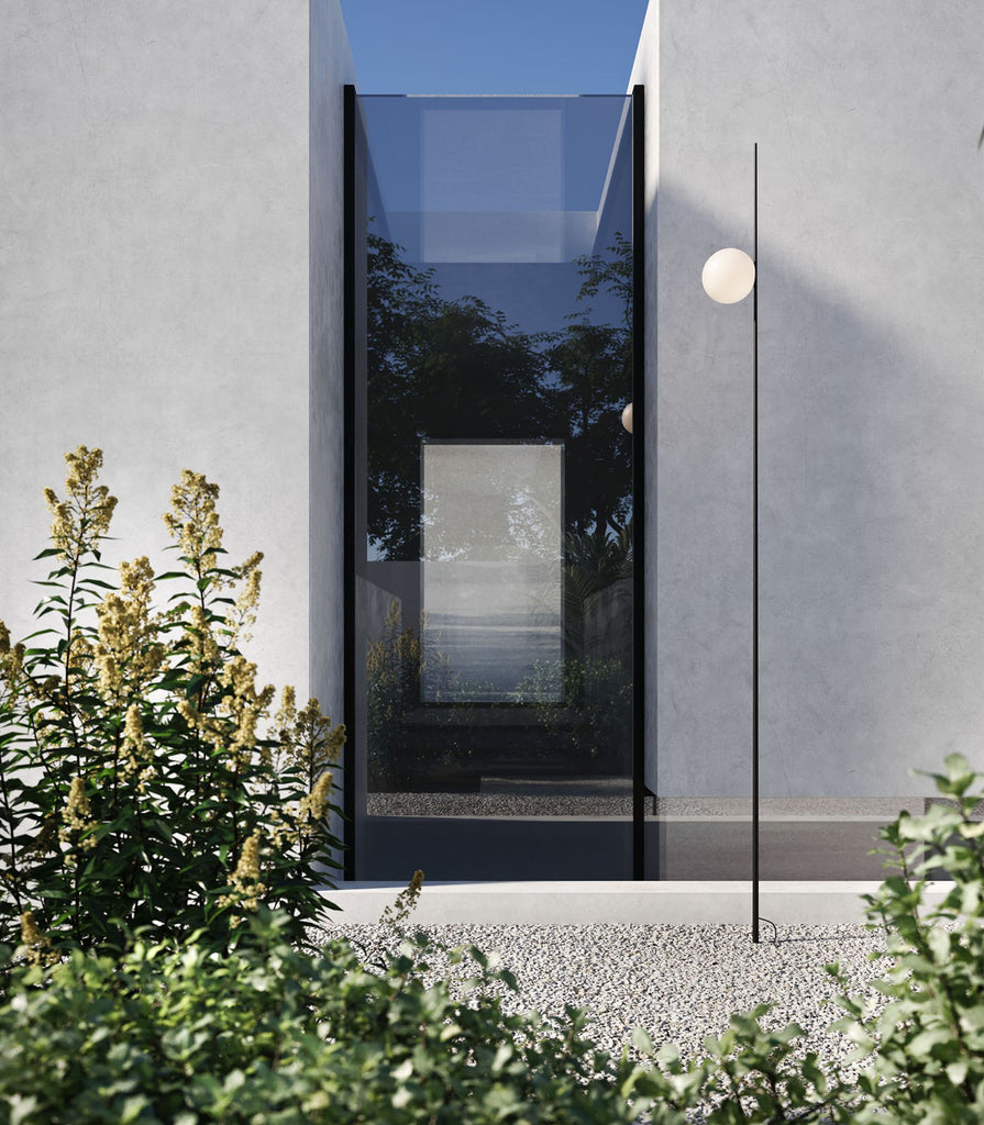 Karman Atmosphere Bollard Light featured within outdoor space