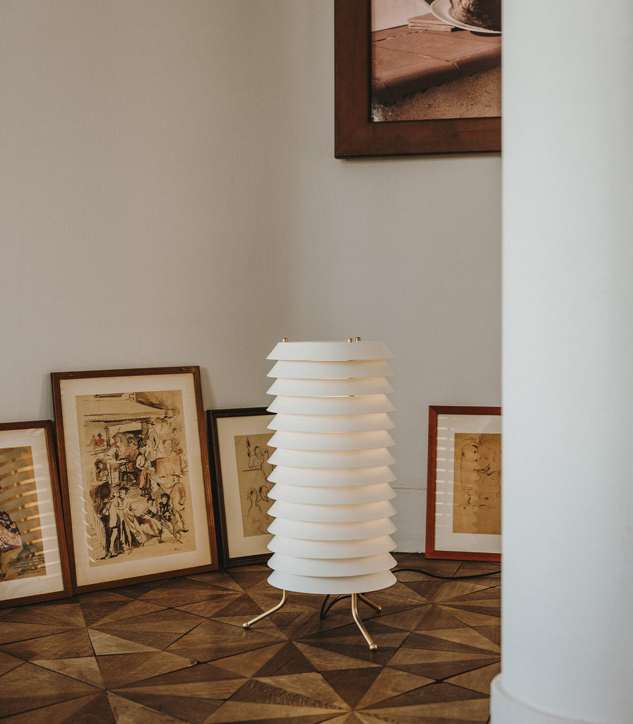 Santa & Cole Maija Floor Lamp featured within interior space