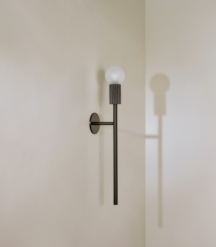 Marz Designs Attalos Black Wall Light featured within interior space