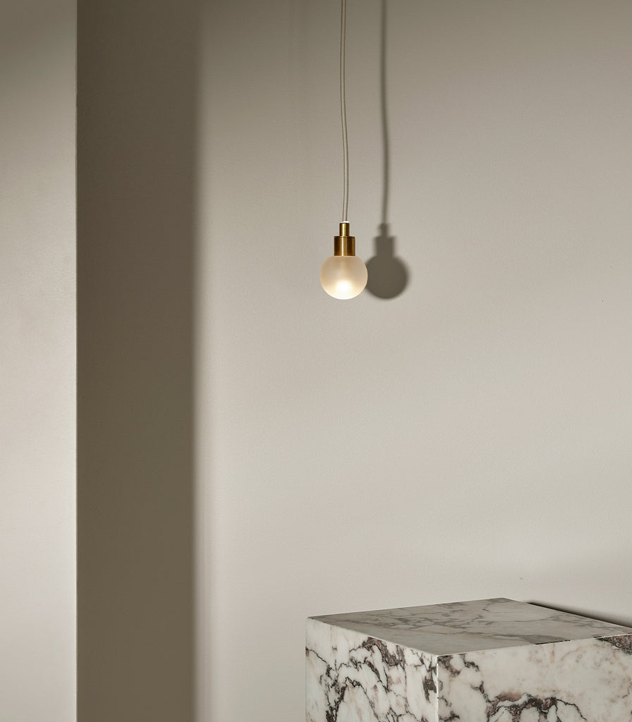 Marz Designs Orb Mini Pendant Light eatured within interior space
