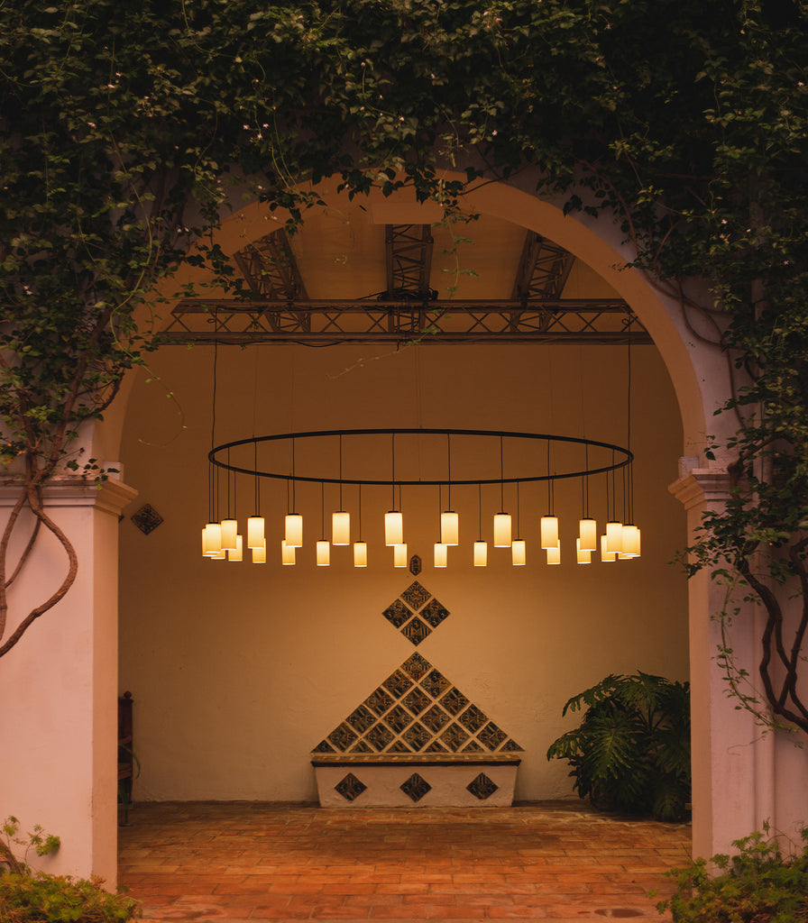Santa & Cole Cirio Circular Pendant Light featured within interior space