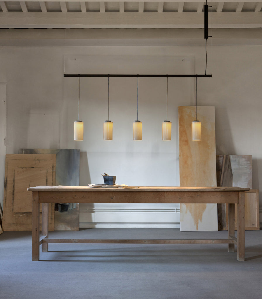 Santa & Cole Cirio Linear Pendant Light featured within interior space