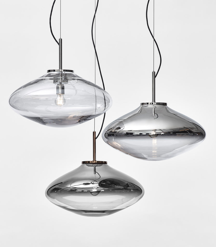 Bomma Disc Glass Pendant Light featured within interior space