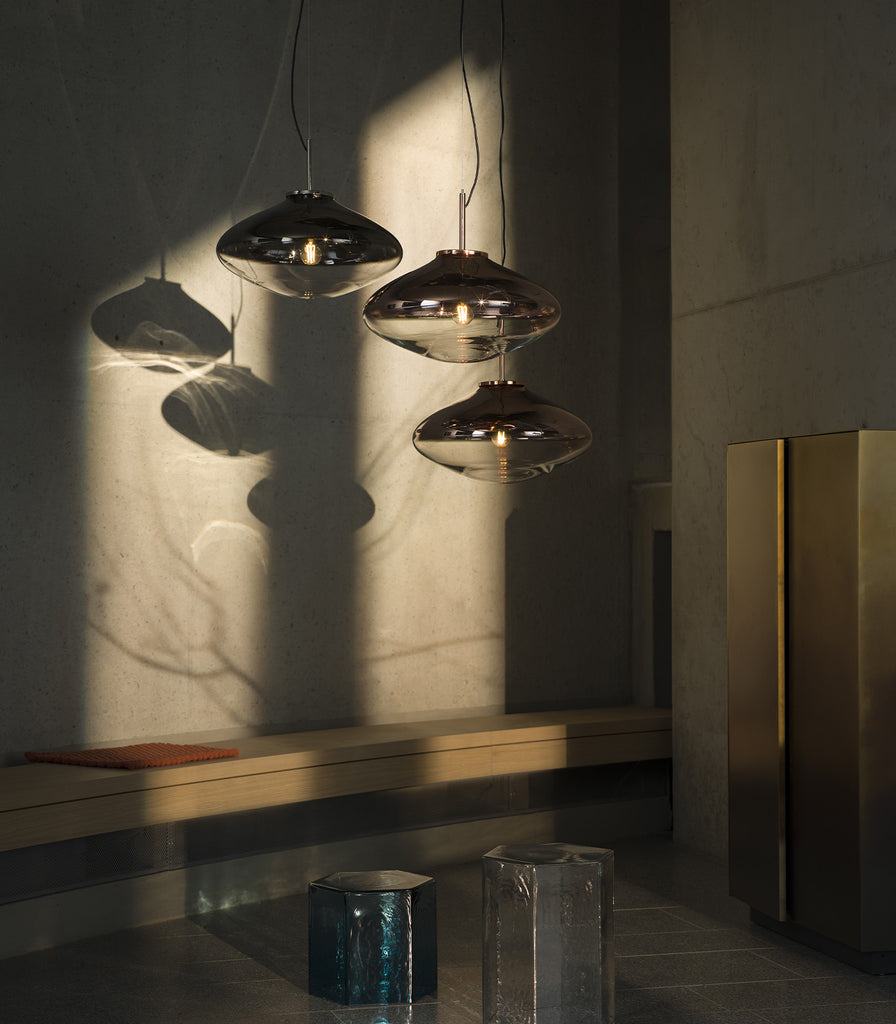 Bomma Disc Glass Pendant Light featured within interior space