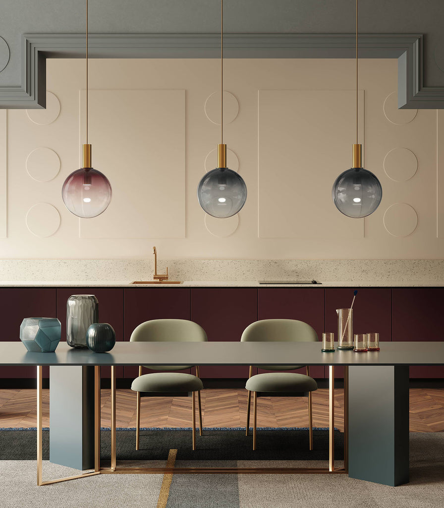 Bomma Divina Pendant Light hanging over dining table