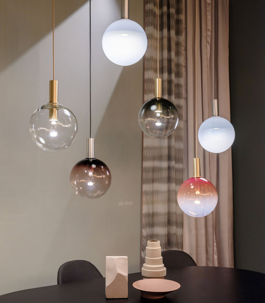 Bomma Divina Pendant Light hanging over dining table