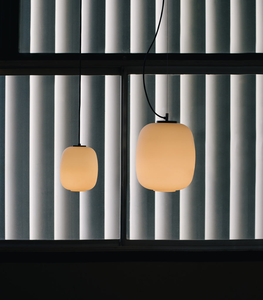 Santa & Cole Globo Cesta Pendant Light featured within interior space