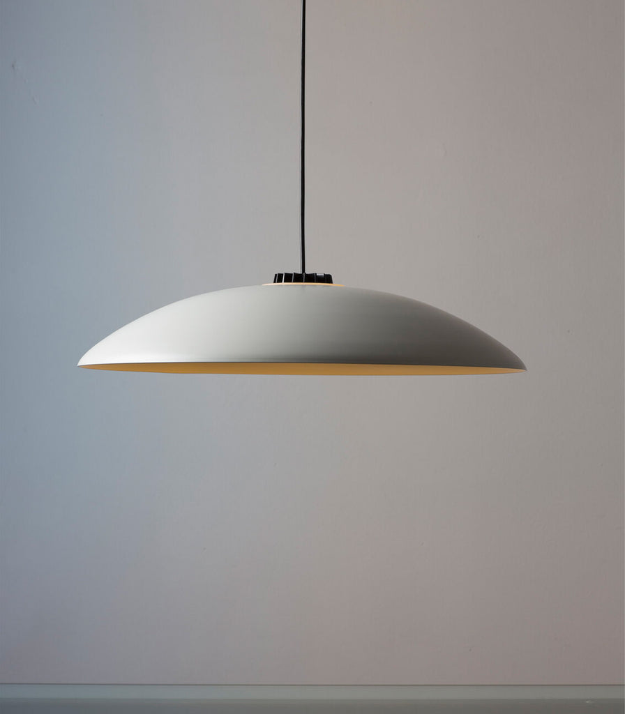 Santa & Cole Headhat Plate Pendant Light featured within interior space