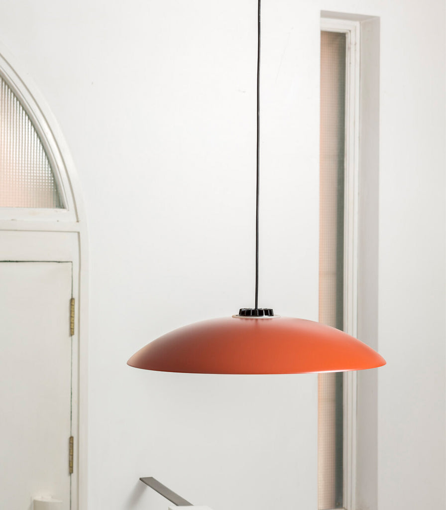 Santa & Cole Headhat Plate Pendant Light featured within interior space