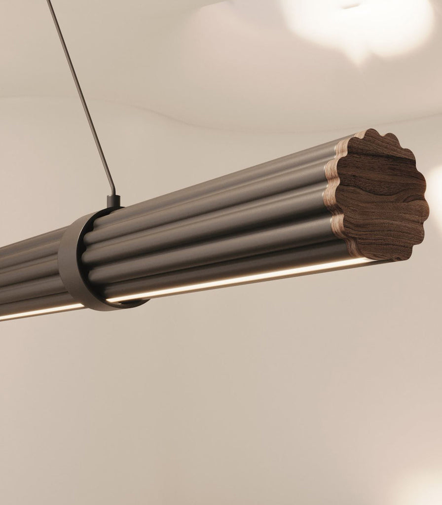 Aromas Niro Linear Pendant Light fearured within interior space