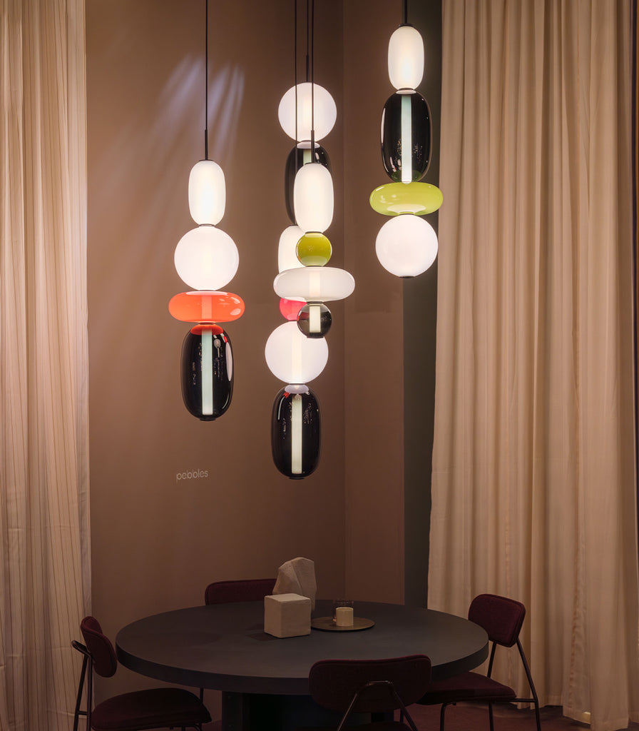 Bomma Pebbles Small Pendant Light hanging over dining table