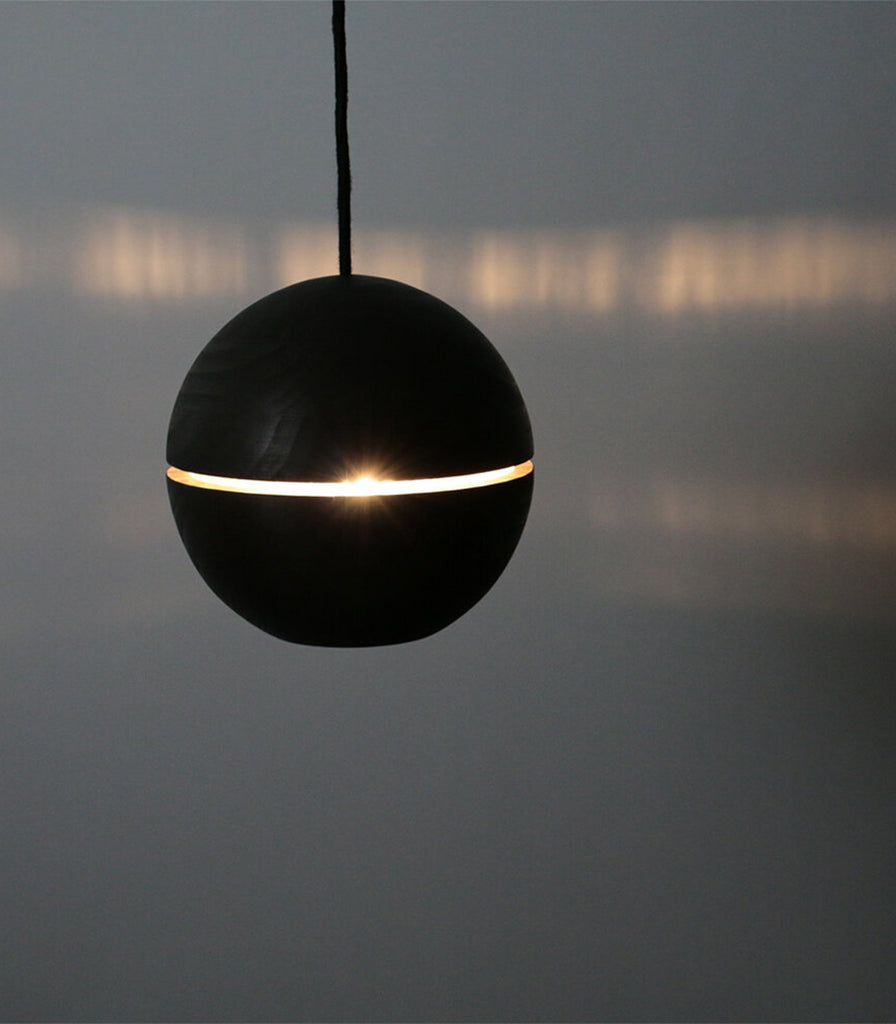 Ilanel Saturn Pendant Light featured within interior space