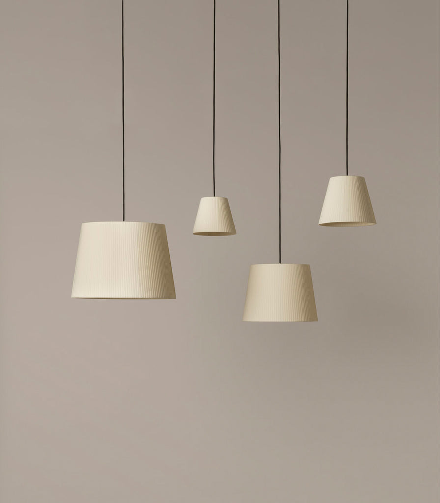 Santa & Cole Sisisi Conicas Pendant Light featured within interior space