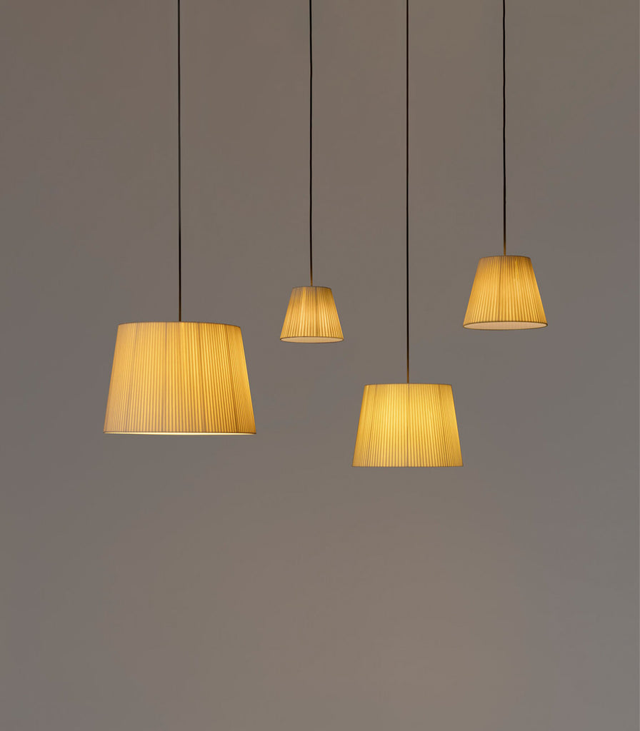 Santa & Cole Sisisi Conicas Pendant Light featured within interior space