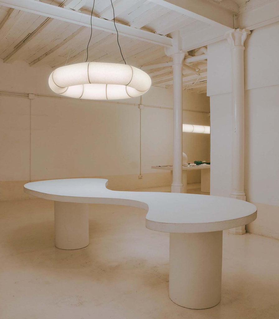 Santa & Cole Tekio Circular Pendant Light  featured within interior space