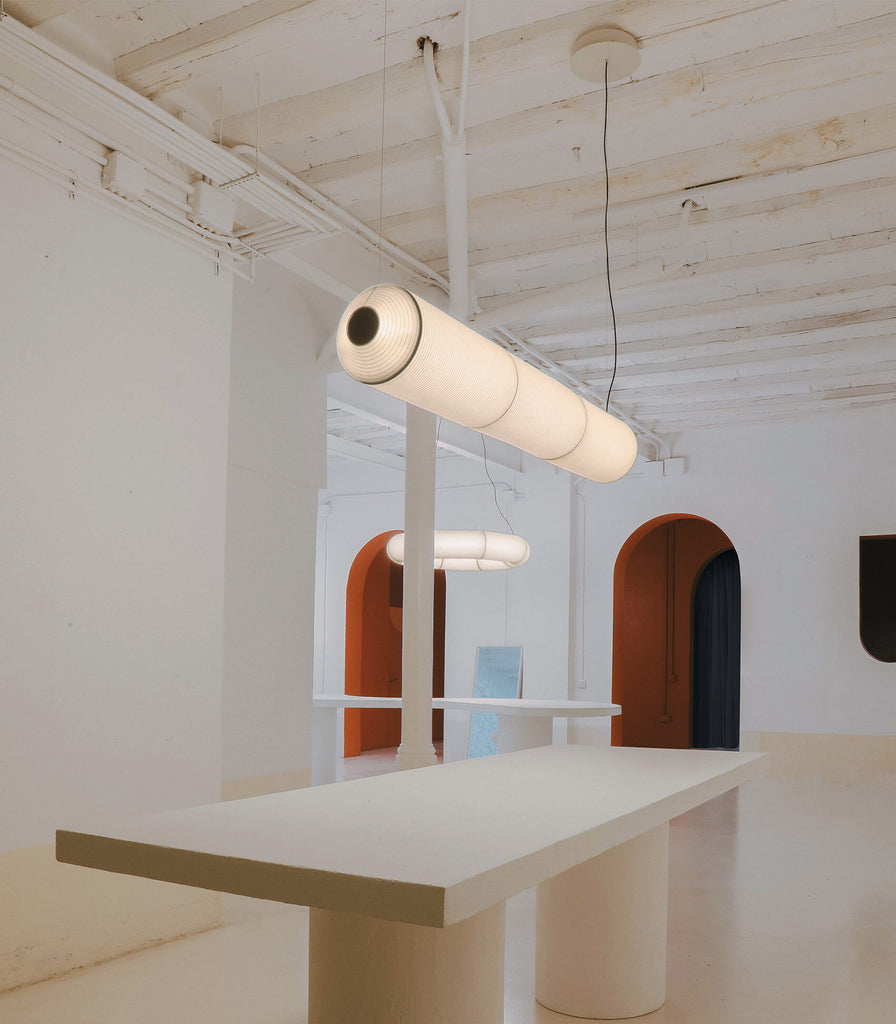 Santa & Cole Tekio Horizontal Pendant Light featured within interior space