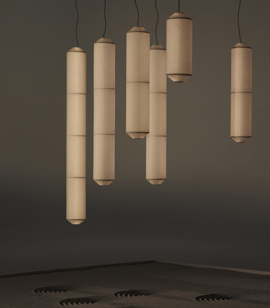 Santa & Cole Tekio Vertical Pendant Light featured within interior space