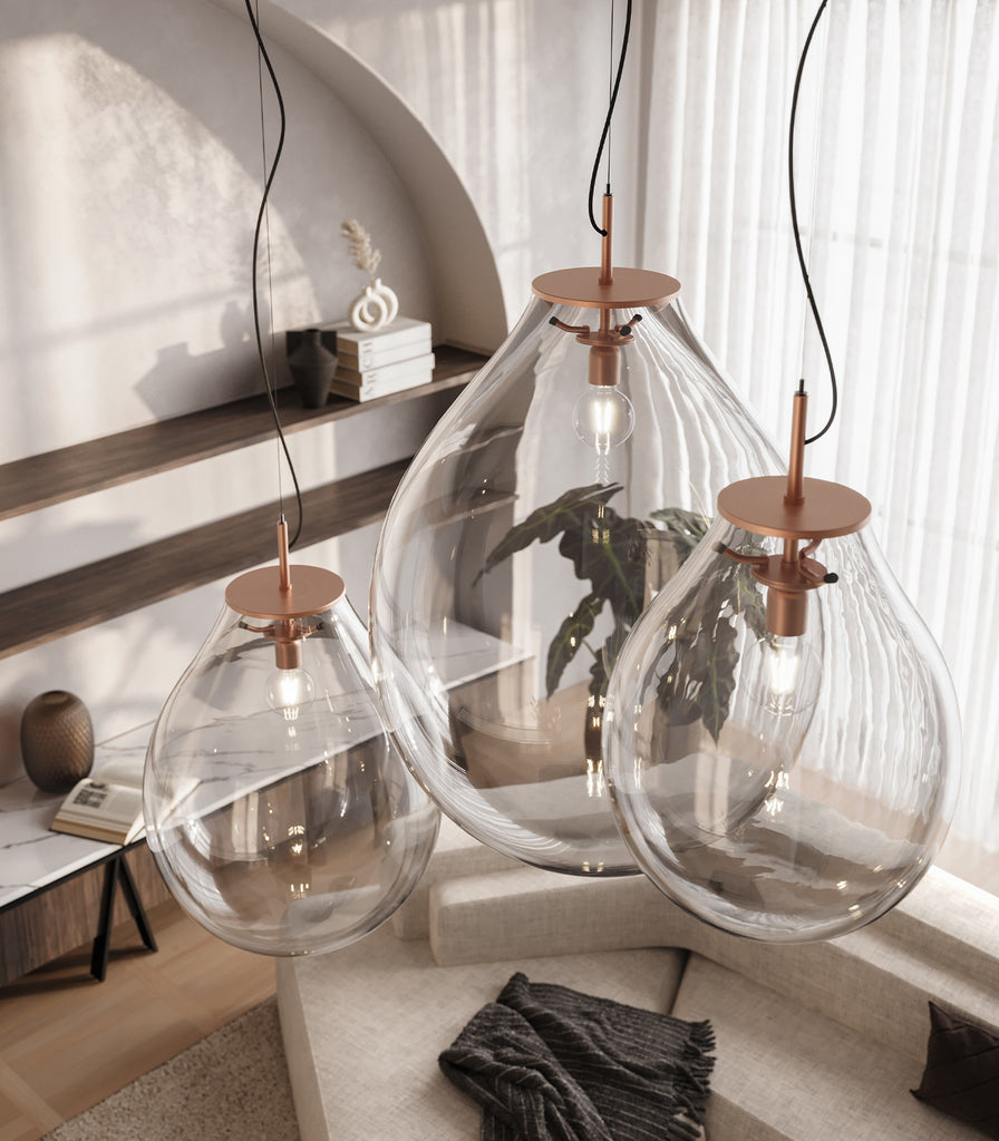 Bomma Tim Copper Pendant Light hanging in a living room