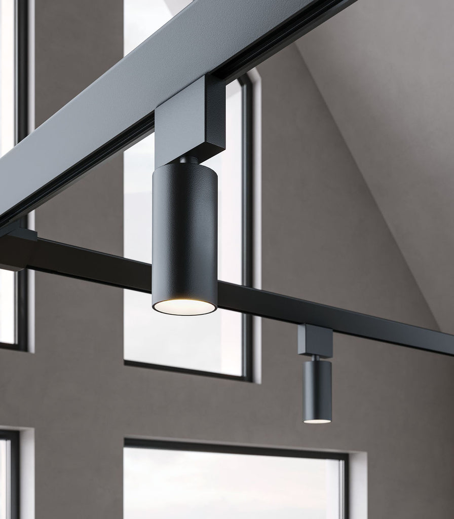 Karman Turn It Rectangle Pendant Light featured within interior space