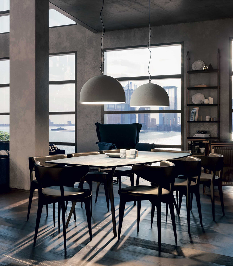 Lodes Urban Concrete Pendant Light hanging over dining table
