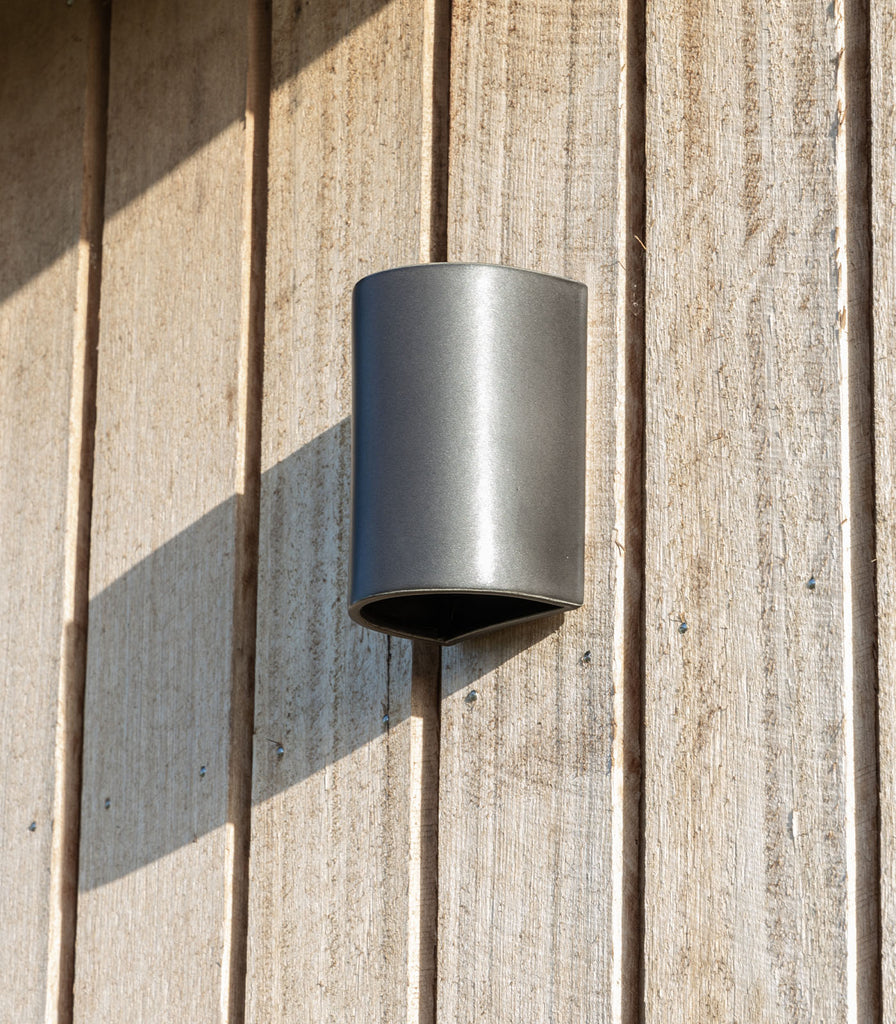 We Ponder Slate Short Outdoor Wall Light featured within outdoor space