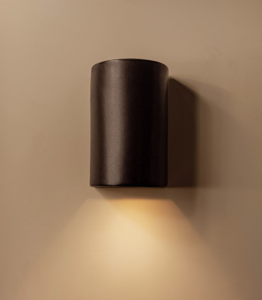 We Ponder Slate Short Wall Light featured within interior space