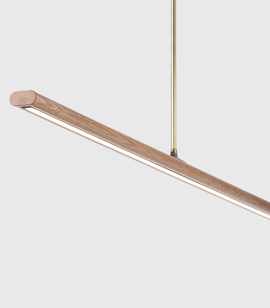 Fluxwood Spru Linear Pendant Light featured within interior space