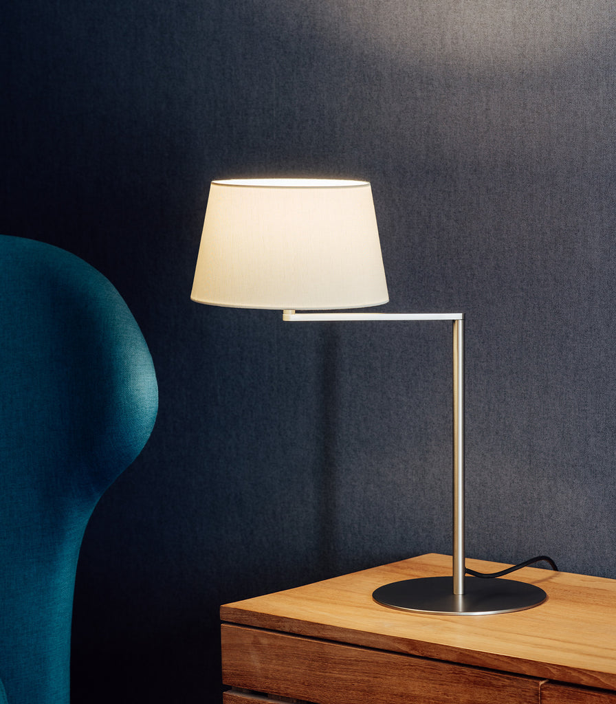 Santa & Cole Americana Table Lamp featured within interior space