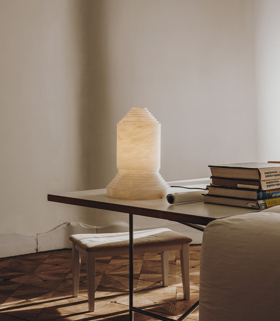 Santa & Cole Babel Alabaster Table Lamp featured within interior space