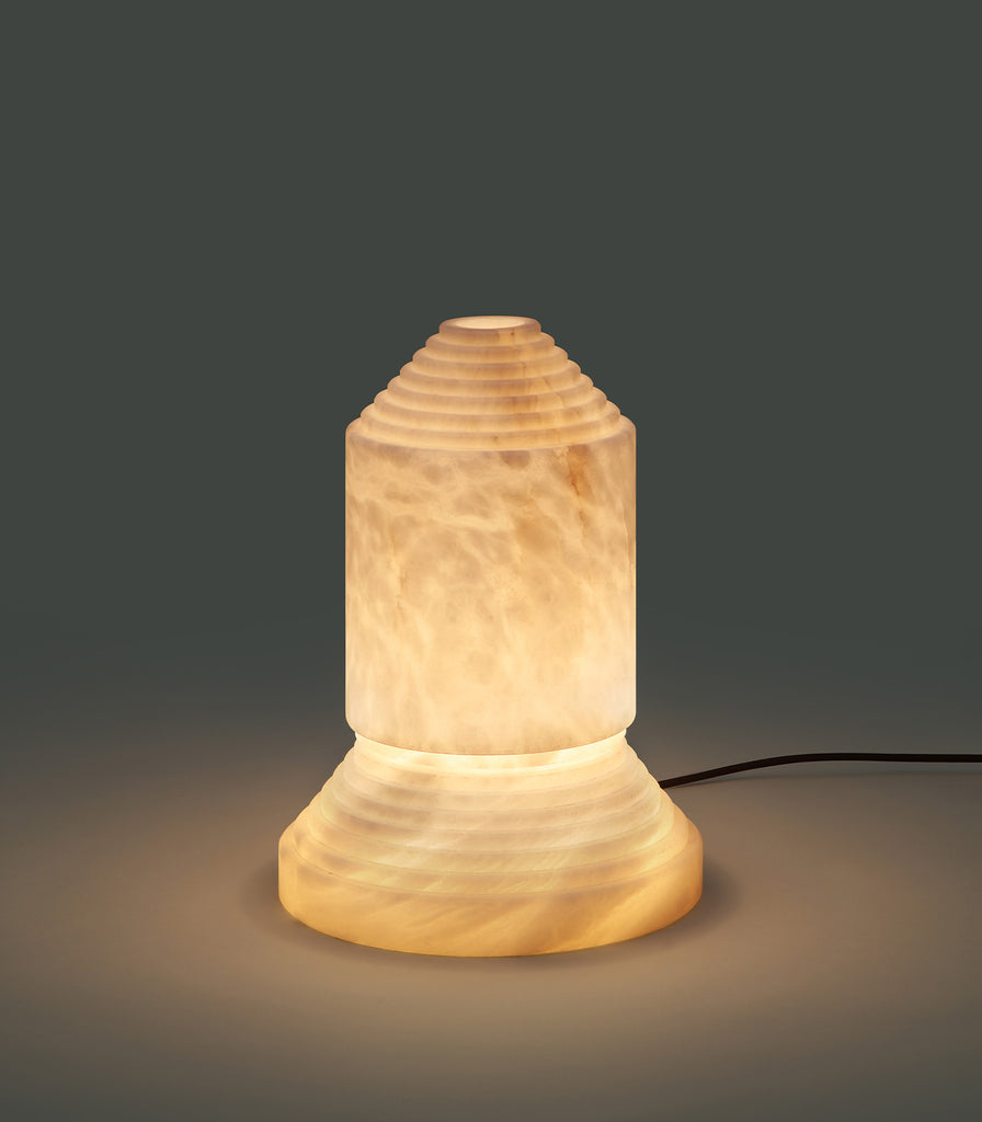 Santa & Cole Babel Alabaster Table Lamp featured within interior space