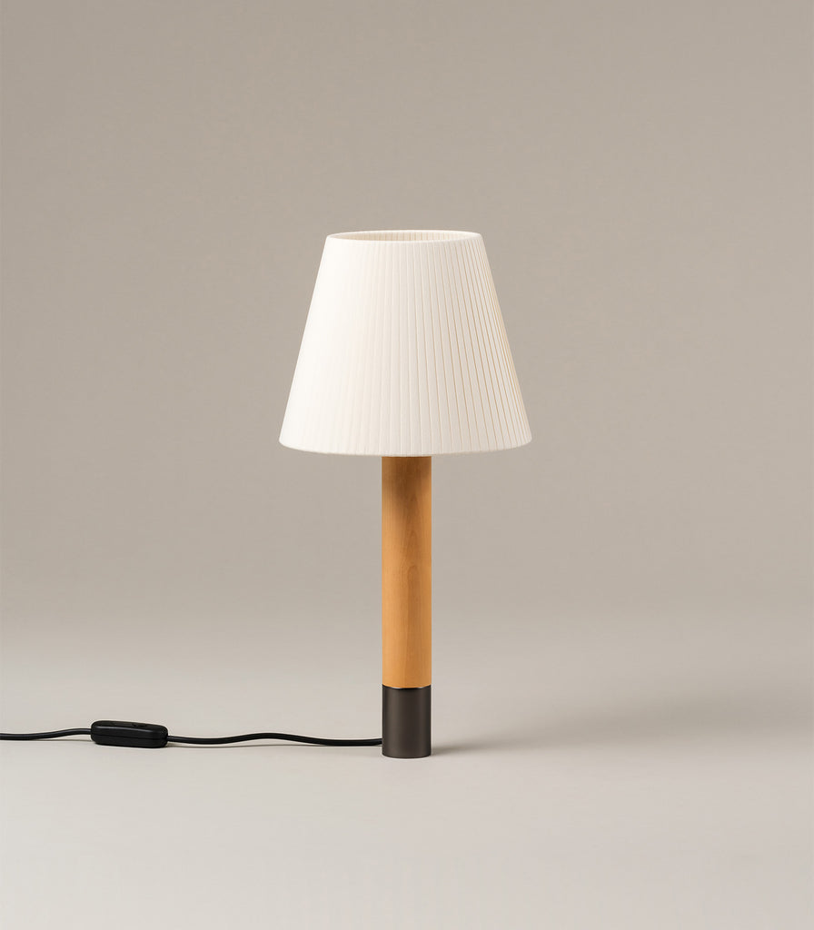 Santa & Cole Basica Table Lamp featured within interior space