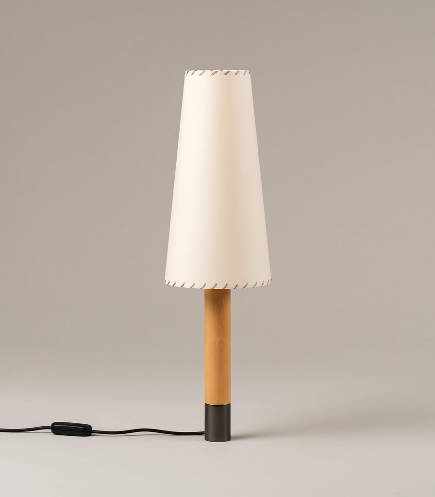 Santa & Cole Basica Tall Table Lamp featured within interior space