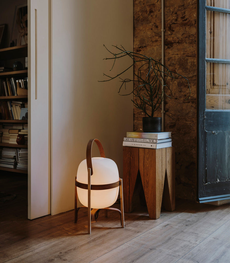 Santa & Cole Cesta Table Lamp featured within interior space