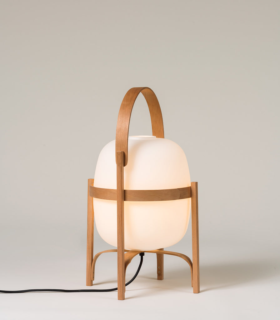 Santa & Cole Cesta Table Lamp featured within interior space