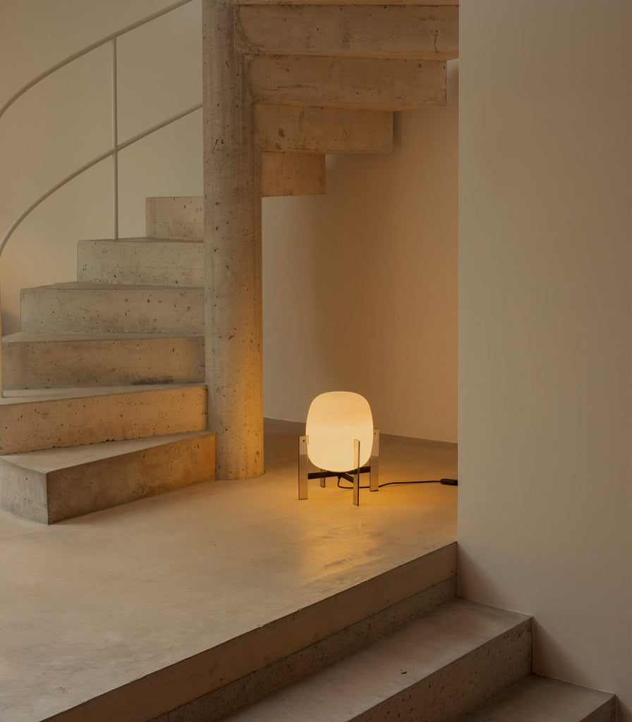 Santa & Cole Cesta Metalica Table Lamp featured within interior space