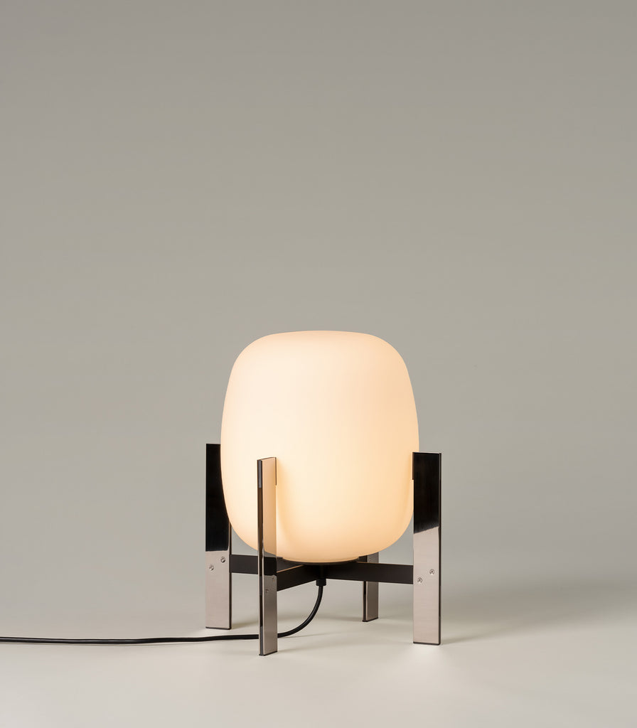 Santa & Cole Cesta Metalica Table Lamp featured within interior space