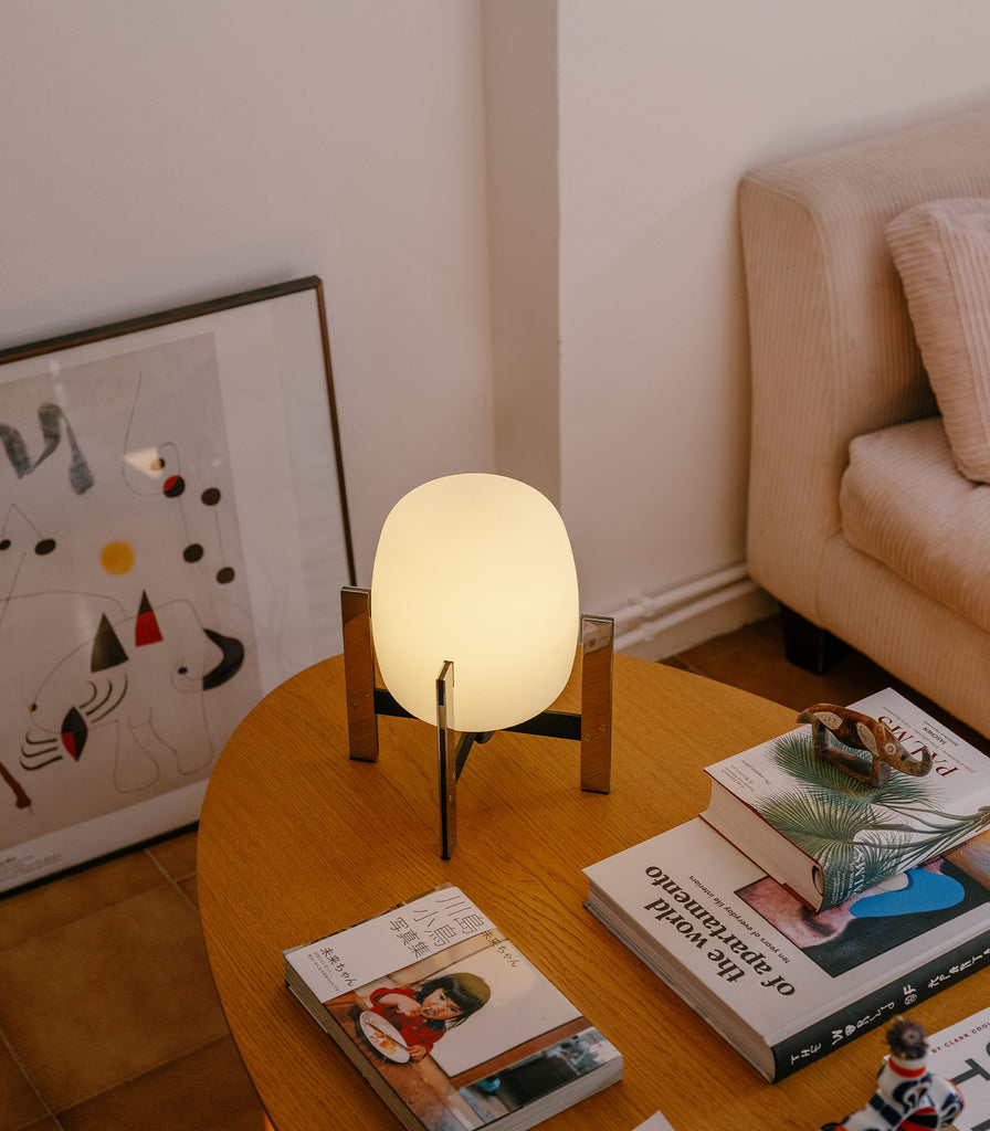 Santa & Cole Cestita Metalica Table Lamp featured within interior space