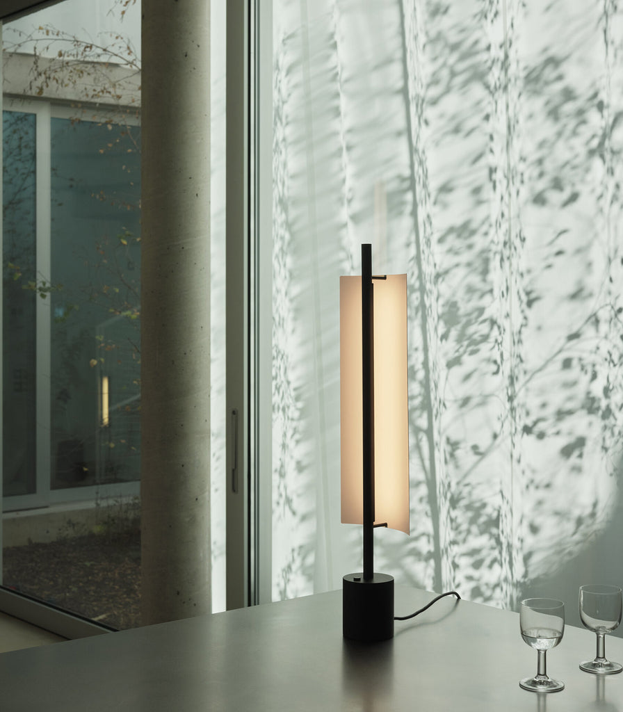 Santa & Cole Lamina Table Lamp featured within interior space